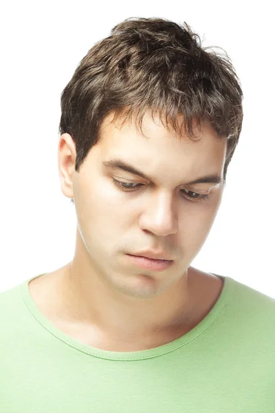 Портрет грустного молодого человека на белом фоне — стоковое фото