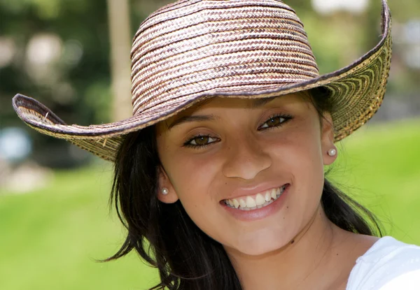 The beautiful Colombian girl in a hat — Stock Photo, Image