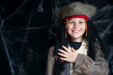 Little boy wearing pirate costume clipart