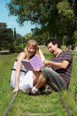 College or university students studying outdoors clipart