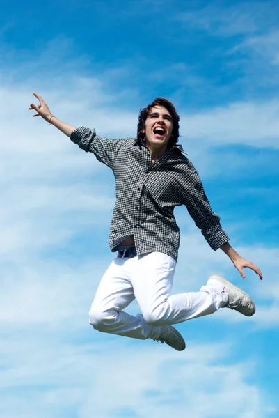 Cara feliz pulando — Fotografia de Stock
