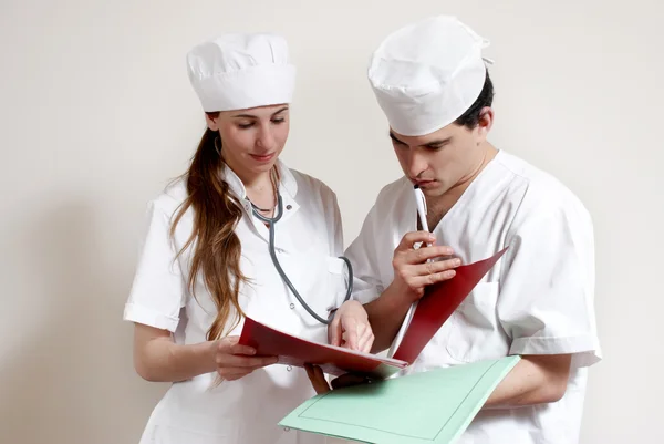 Group of doctors in working conditions — Stock Photo, Image