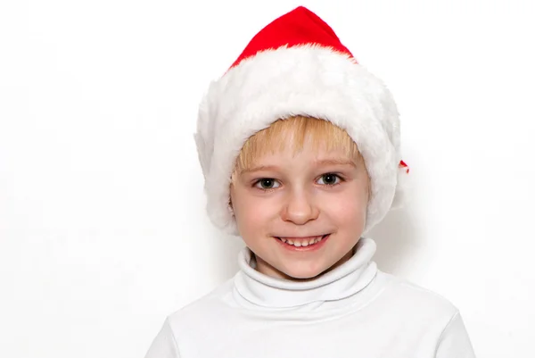 Little Santa Claus on a light background — Stock Photo, Image