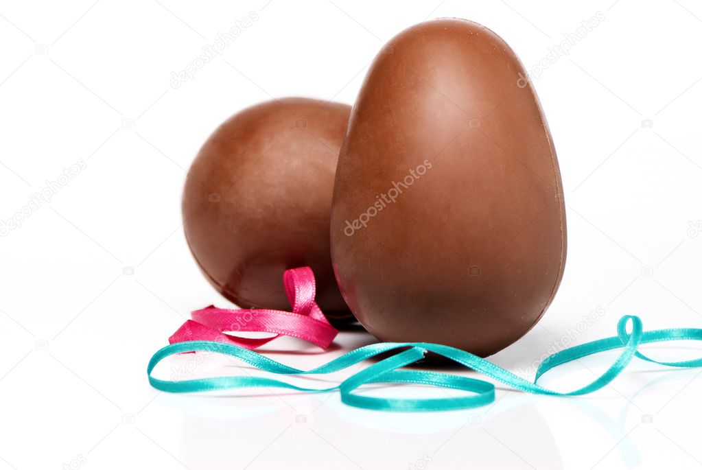 Chocolate eggs on light background