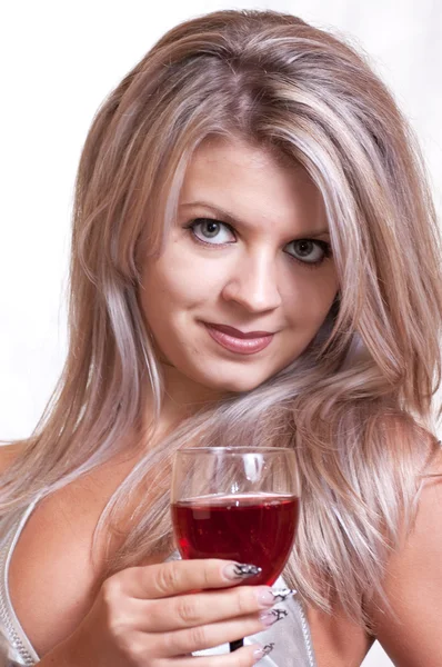 Flicka med vin Stockbild