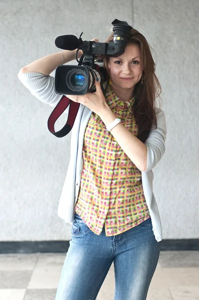 Lány egy videocamera — Stock Fotó