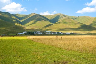 Blue sky and green hills clipart