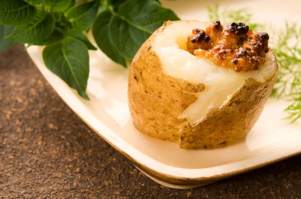 Baked potato with sour cream, grain Dijon mustard and herbs — Stock Photo, Image