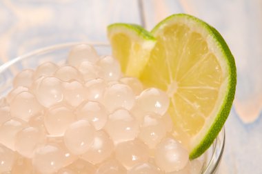 Tapioca pearls with lime. white bubble tea ingredients clipart