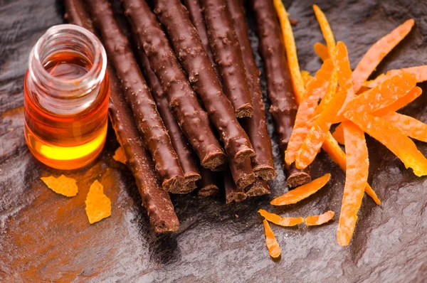 Chocolate sticks with orange — Stock Photo, Image