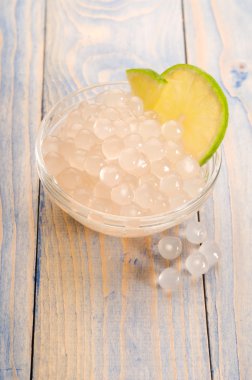 Tapioca pearls with lime. white bubble tea ingredients clipart