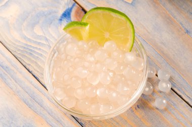 Tapioca pearls with lime. white bubble tea ingredients clipart