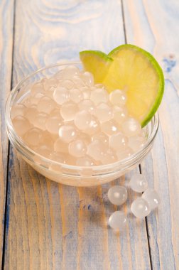 Tapioca pearls with lime. white bubble tea ingredients clipart