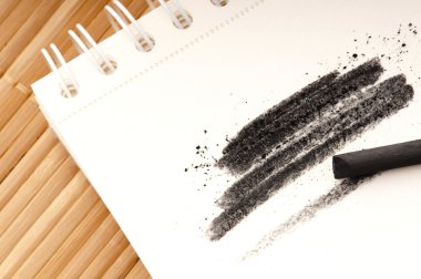Black charcoal with smudge clipart