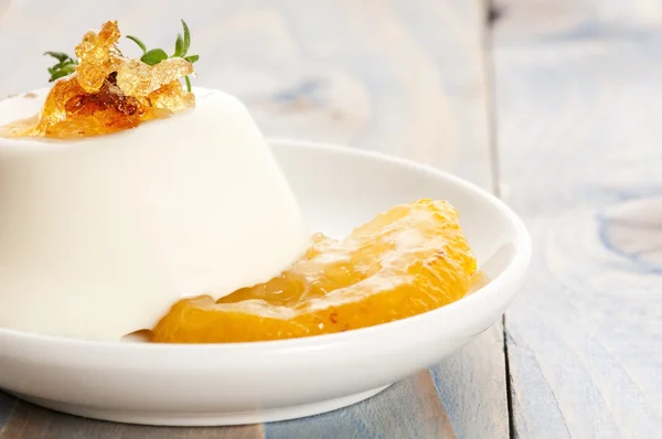 Vanilla Panna Cotta Dessert with lemon and fresh herbs — Stock Photo, Image