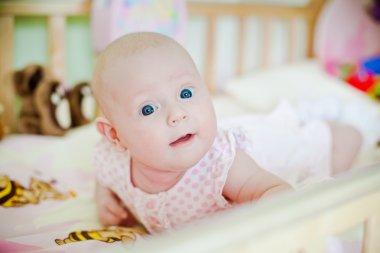 Baby Lying On A Belly clipart