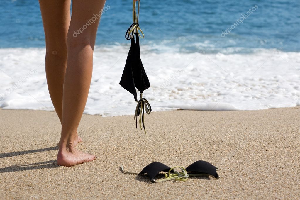 Taking Off Swimsuit Beach Stock Photos - Free & Royalty-Free Stock Photos  from Dreamstime