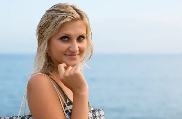 Attractive blonde in the blue sea — Stock Photo, Image