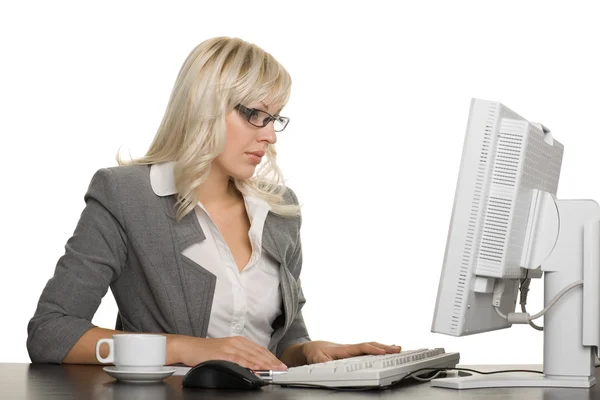 Successful young businesswoman with computer — Stock Photo, Image