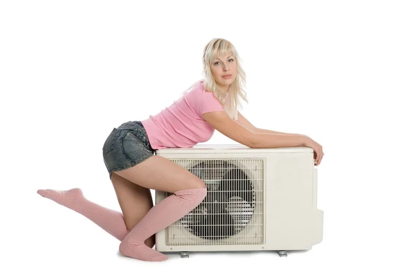 Beautiful girl with the air conditioner. — Stock Photo, Image