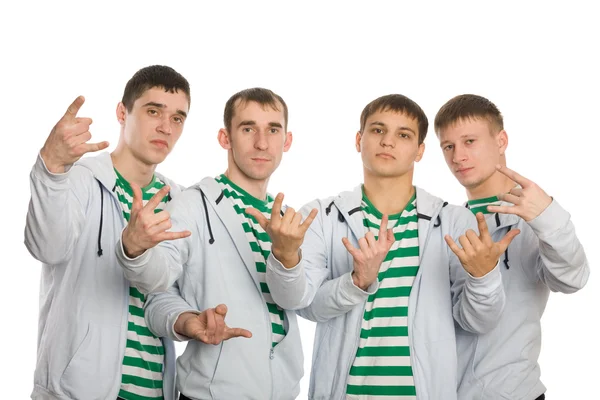 Team of young guys gesticulating fingers — Stock Photo, Image