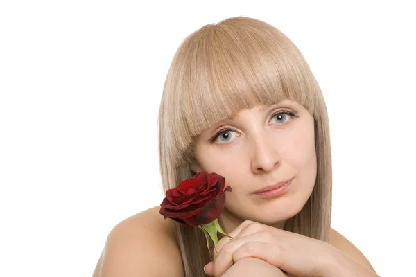 Hermosa joven con una rosa — Foto de Stock