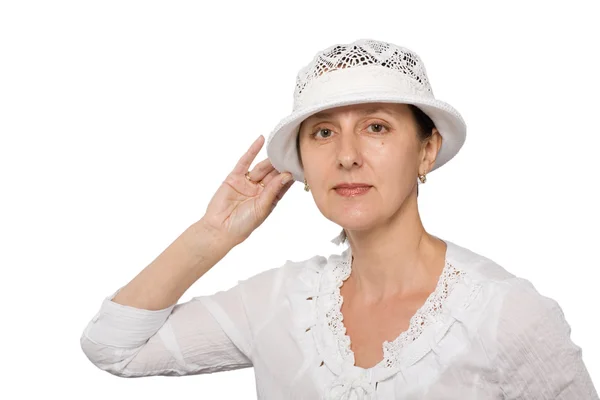 Beautiful middle aged woman in hattock — Stock Photo, Image