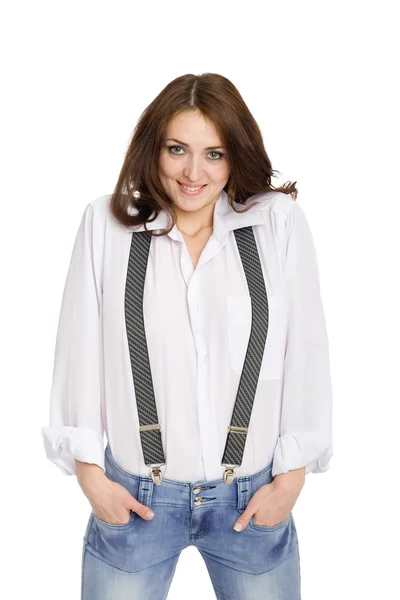 Jonge vrouw in spijkerbroek gordel met bretels — Stockfoto