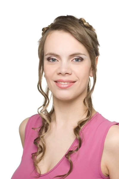 Lächelnde junge Frau in rosa Bluse — Stockfoto