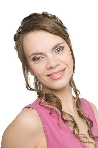 Lächelnde junge Frau in rosa Bluse — Stockfoto