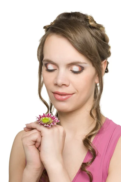 Lachende meisje met een bloem — Stockfoto