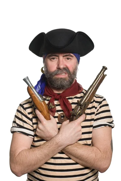Бородатый пират в шляпе трикорна с мушкетами — стоковое фото