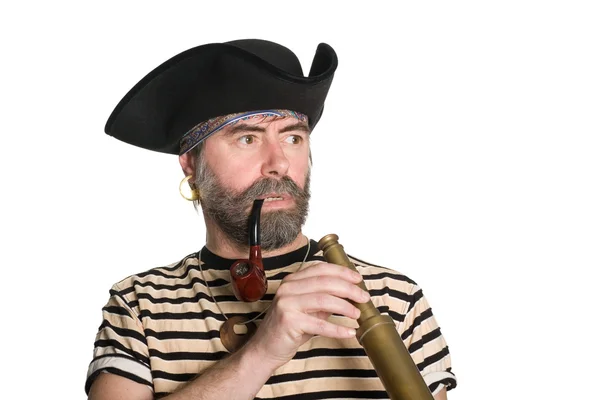 Pirat håller ett teleskop — Stockfoto