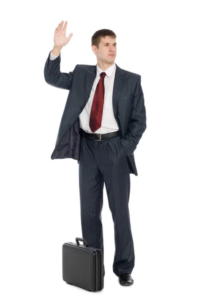 Handsome young businessman with a welcoming gesture — Stock Photo, Image