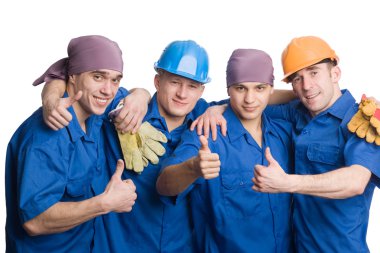 Friendly young team of construction workers