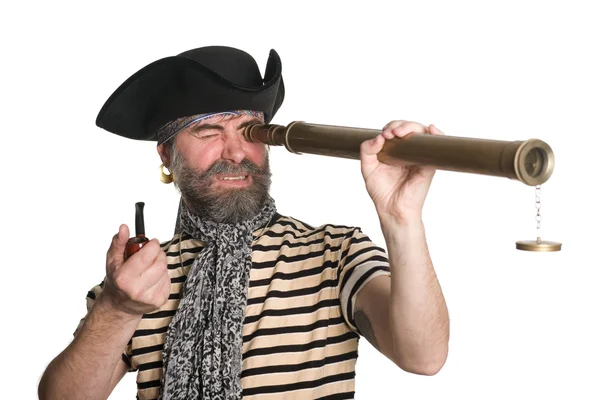 Pirat blickt durch ein Teleskop — Stockfoto