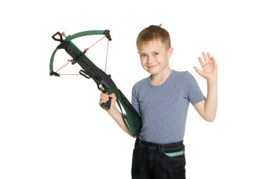 Smiling boy holding a crossbow clipart