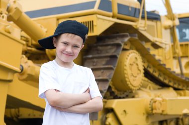 Smiling boy in a cap clipart