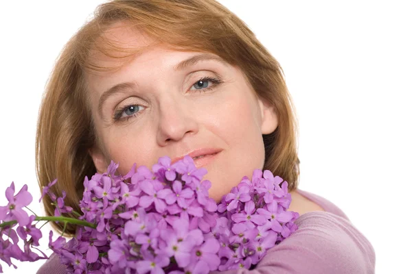 Stående kvinna med blommor. — Stockfoto