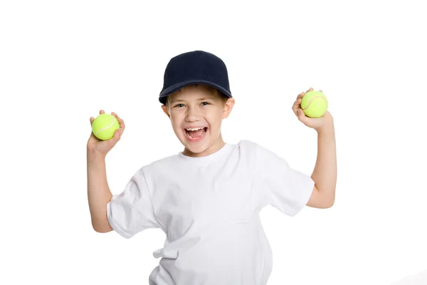 Chico gritando con pelotas de tenis — Foto de Stock
