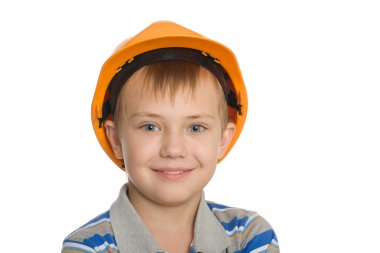 Boy in the construction helmet. clipart