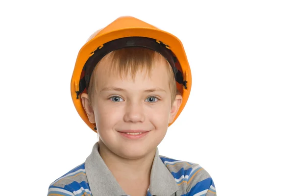 Menino no capacete de construção . — Fotografia de Stock