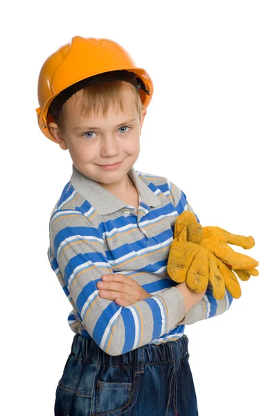 Радісний хлопчик у будівельному шоломі — стокове фото