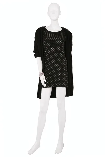 Manekýn oblečen v černém, malé šaty a svetr — Stock fotografie