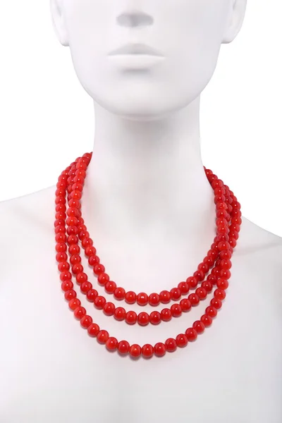 Červené korálový náhrdelník na manekýnka — Stock fotografie