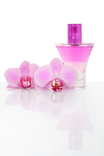 Óleo base de perfume e flores de orquídeas — Fotografia de Stock