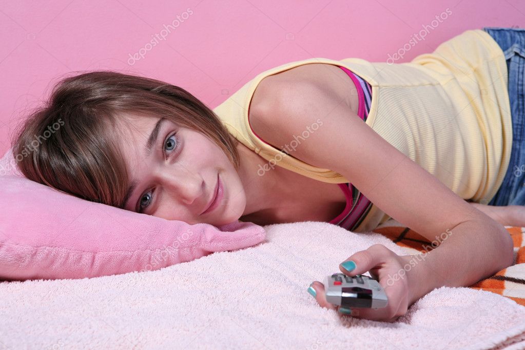 Teenage girl laying on the bed