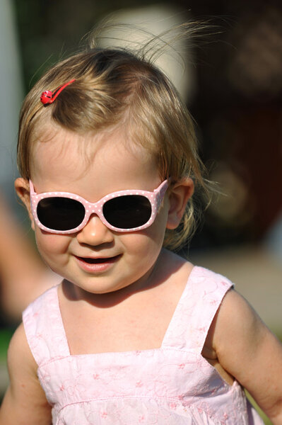Little girl with sunglasses portrait