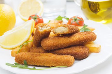 Breaded fish sticks with french fries clipart