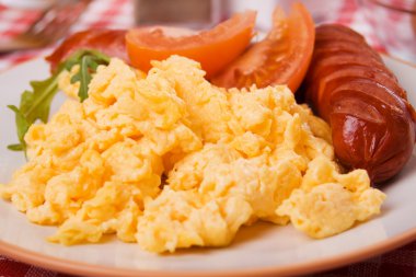 Scrambled eggs and sausage clipart